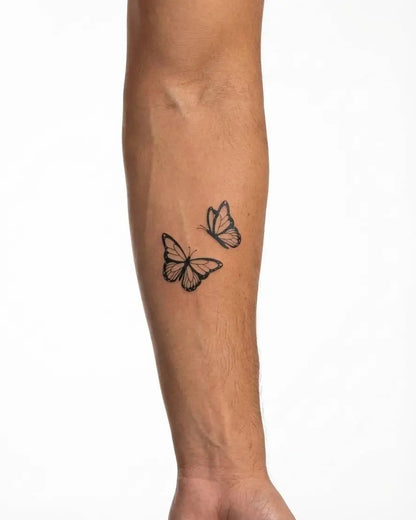 INKON Butterfly Pair semi-permanent tattoo applied on a man – 2 x 2 in (5x5cm) design, realistic ink look, lasts 10 days