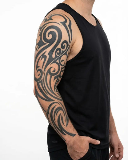 INKON Organic Tribal Foliage semi-permanent tattoo applied on a man – 8 x 20 in (20x50cm) design, realistic ink look, lasts 10 days