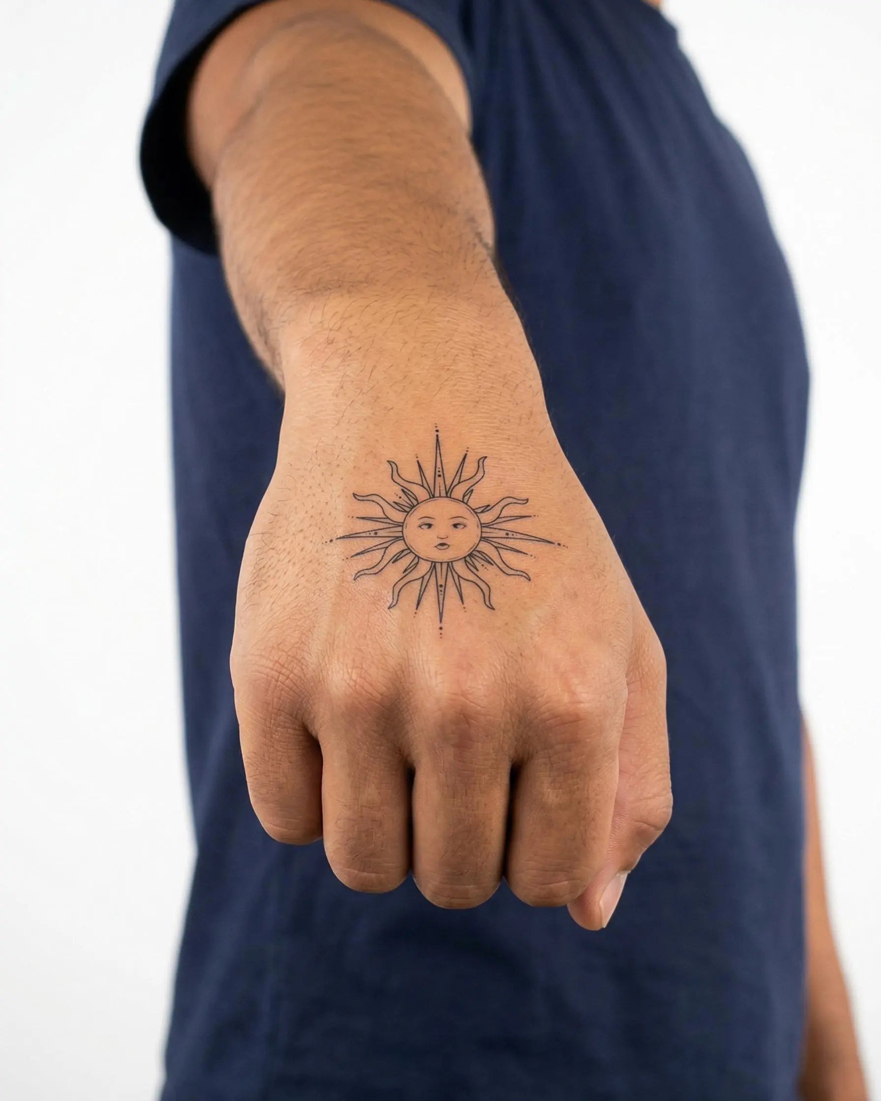 INKON Celestial Sun Face 2 semi-permanent tattoo applied on a man – 2 x 2 in (5x5cm) design, realistic ink look, lasts 10 days