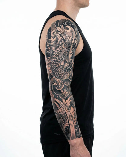 INKON Koi Fish & Waves Sleeve semi-permanent tattoo applied on a man – 8 x 20 in (20x50cm) design, realistic ink look, lasts 10 days