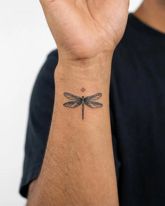 INKON Dragonfly semi-permanent tattoo applied on a man – 2 x 2 in (5x5cm) design, realistic ink look, lasts 10 days