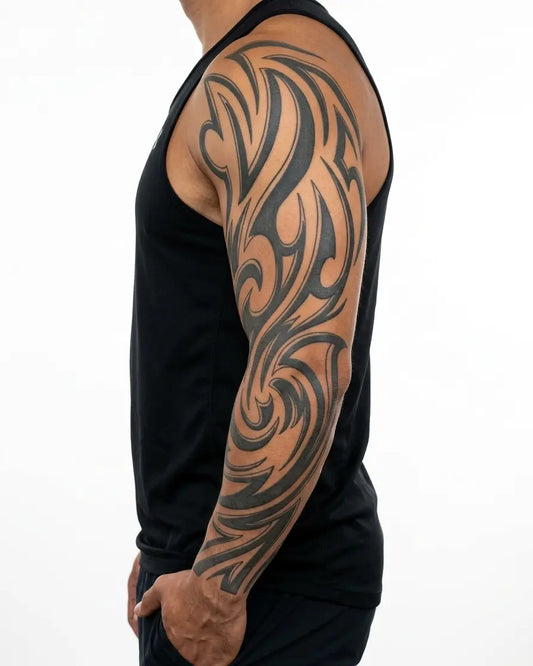 INKON Tribal Wave Sleeve semi-permanent tattoo applied on a man – 8 x 20 in (20x50cm) design, realistic ink look, lasts 10 days