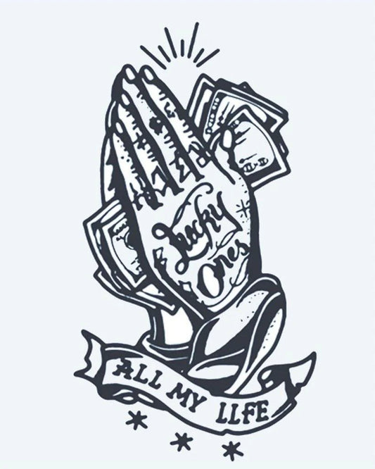 Lucky Ones Praying Hands semi-permanent tattoo design by INKON – praying, hands, holding, cash, lettering illustration, 4 x 7 in (10x17cm), available at inkon.co