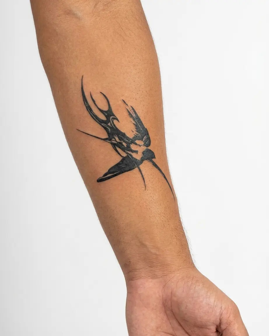 INKON Tribal Swallow semi-permanent tattoo applied on a man – 3 x 4 in (7x10cm) design, realistic ink look, lasts 10 days