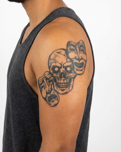 INKON Skull & Drama Masks semi-permanent tattoo applied on a man – 4 x 7 in (10x17cm) design, realistic ink look, lasts 10 days