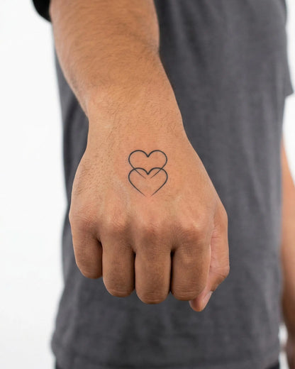 INKON Double Hearts semi-permanent tattoo applied on a man – 2 x 2 in (5x5cm) design, realistic ink look, lasts 10 days