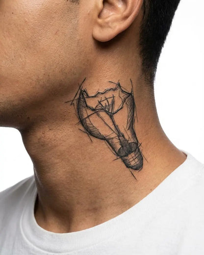 INKON Broken Light Bulb semi-permanent tattoo applied on a man – 3 x 4 in (7x10cm) design, realistic ink look, lasts 10 days