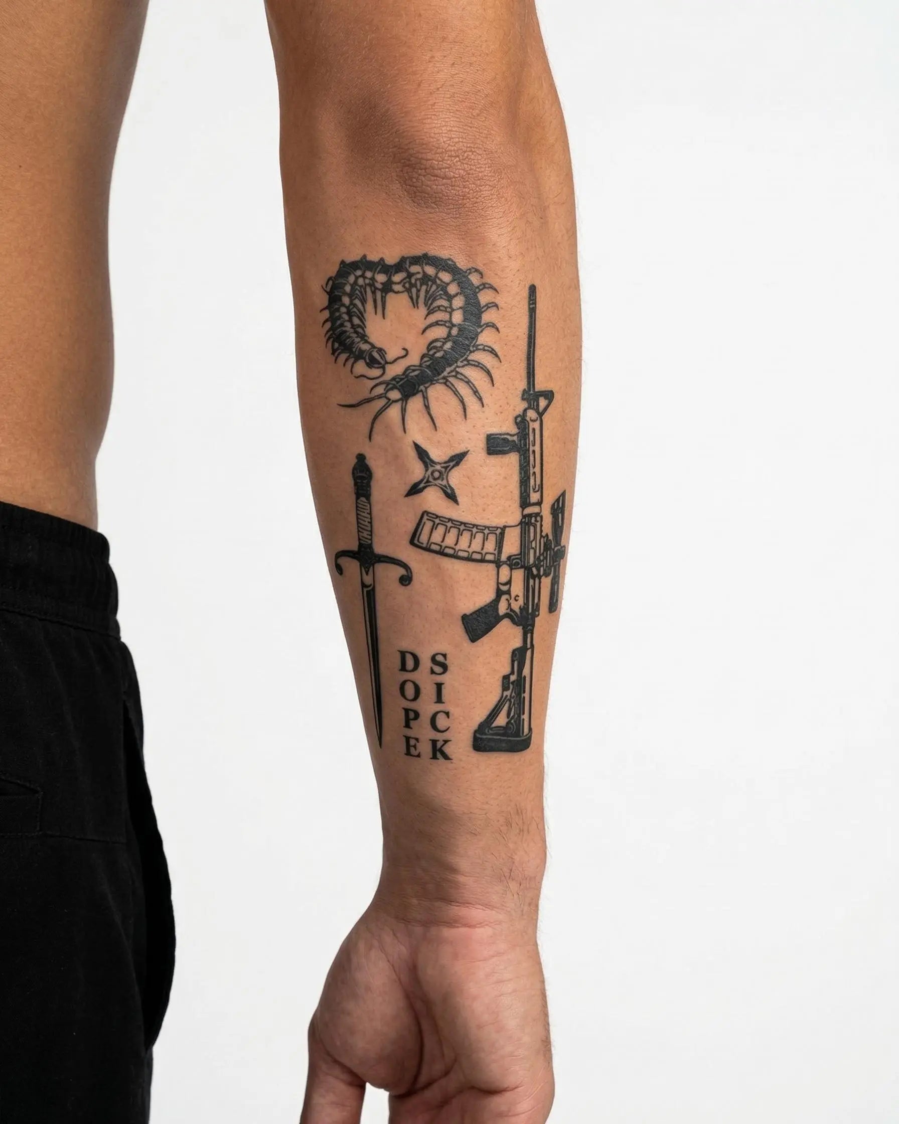 INKON Weapons & Centipede Flash Sheet semi-permanent tattoo applied on a man – 4 x 7 in (10x17cm) design, realistic ink look, lasts 10 days