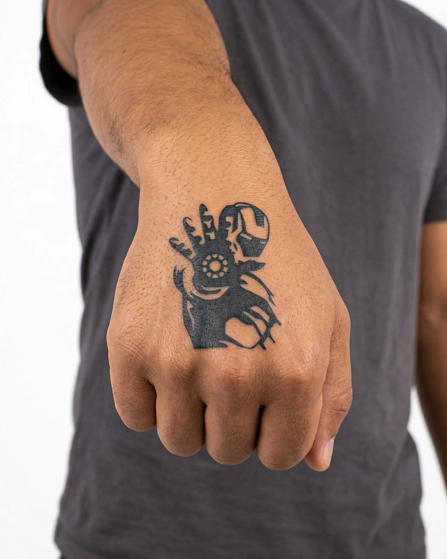 INKON Armored Hero semi-permanent tattoo applied on a man – 2 x 2 in (5x5cm) design, realistic ink look, lasts 10 days