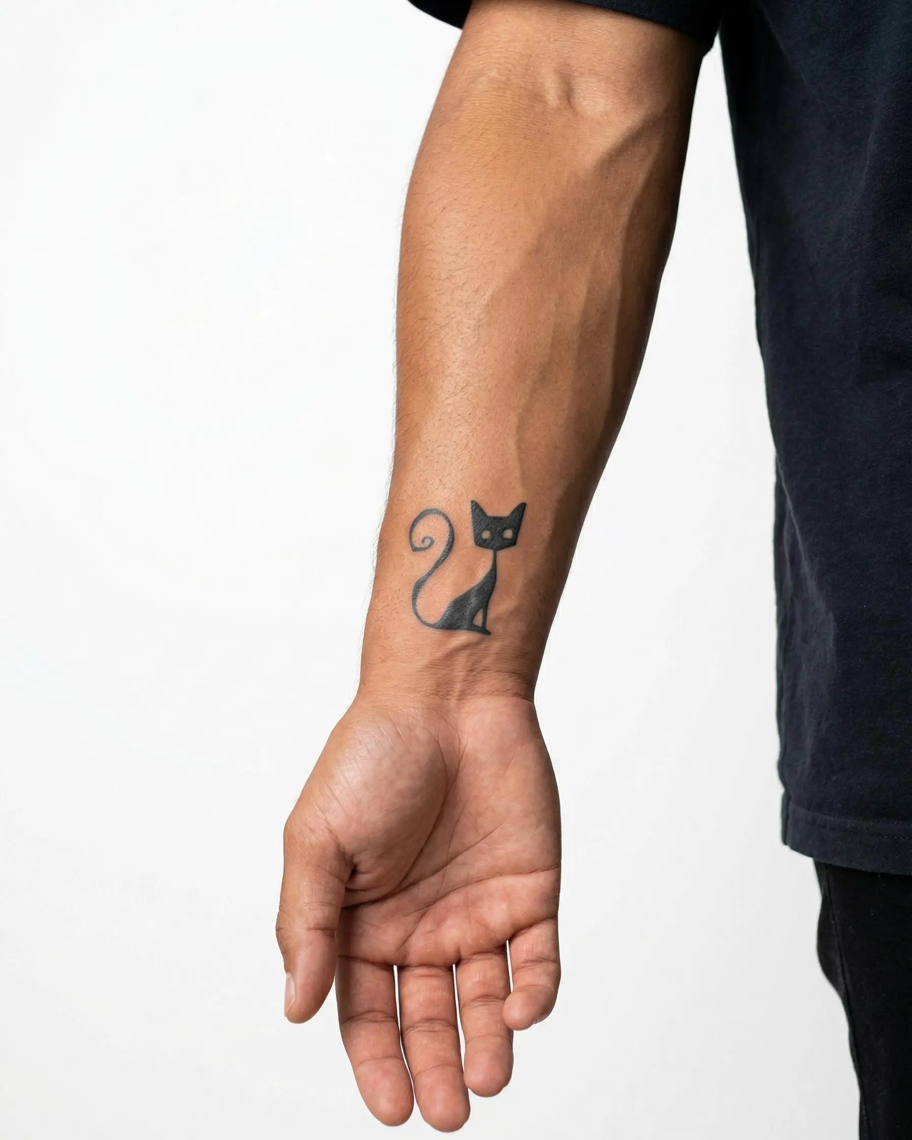 INKON Sitting Cat Silhouette semi-permanent tattoo applied on a man – 2 x 2 in (5x5cm) design, realistic ink look, lasts 10 days