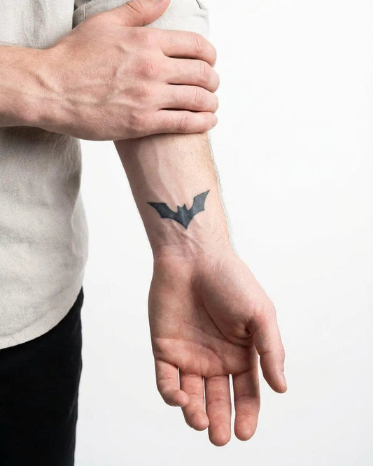 INKON Bat Silhouette semi-permanent tattoo applied on a man – 2 x 2 in (5x5cm) design, realistic ink look, lasts 10 days