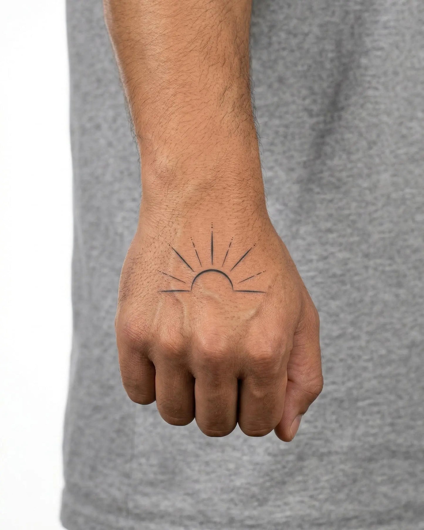 INKON Rising Sun semi-permanent tattoo applied on a man – 2 x 2 in (5x5cm) design, realistic ink look, lasts 10 days