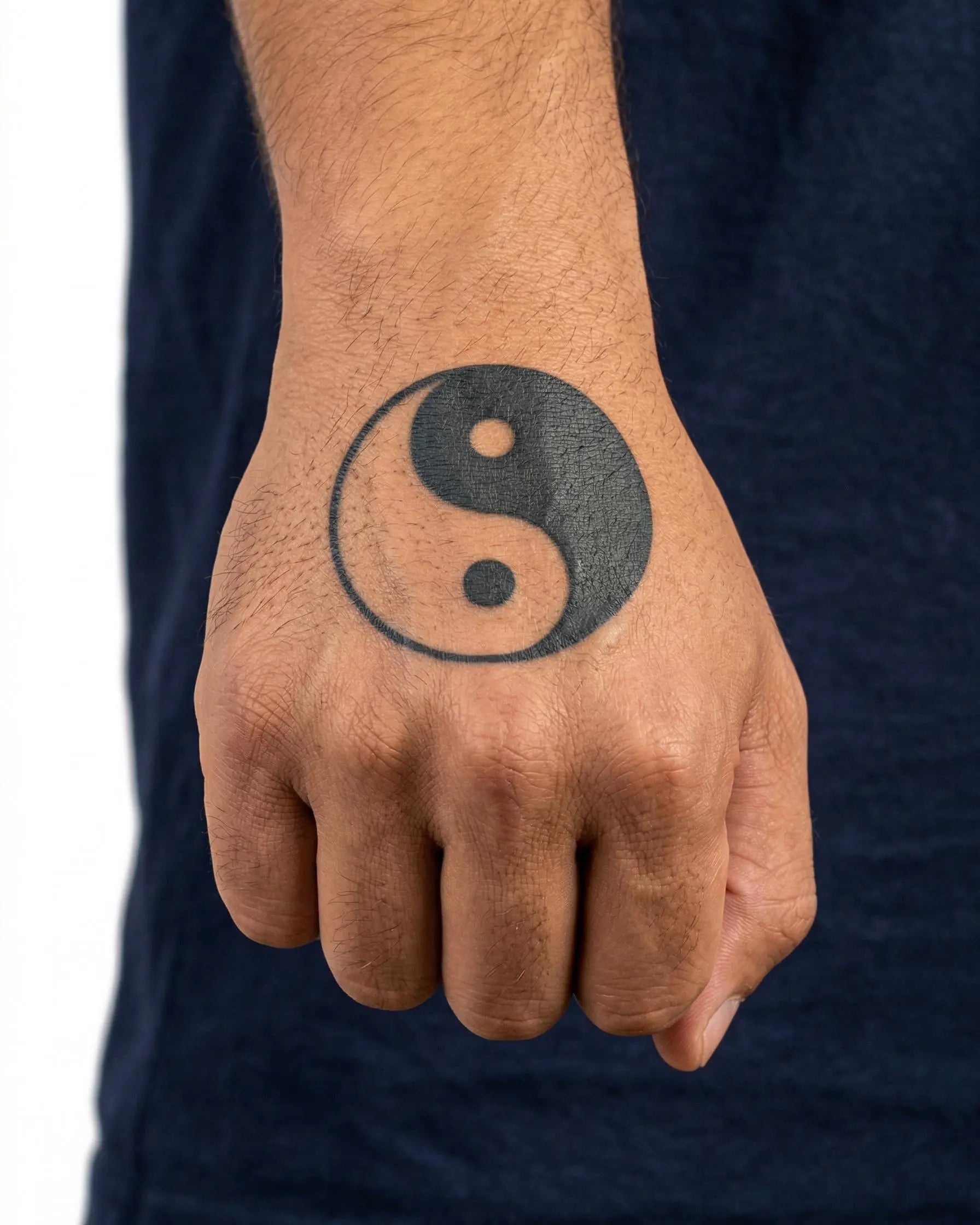 INKON Yin Yang semi-permanent tattoo applied on a man – 2 x 2 in (5x5cm) design, realistic ink look, lasts 10 days