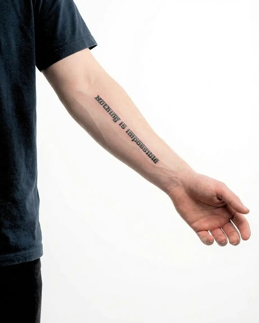 INKON Nothing Is Impossible semi-permanent tattoo applied on a man – 4 x 7 in (10x17cm) design, realistic ink look, lasts 10 days